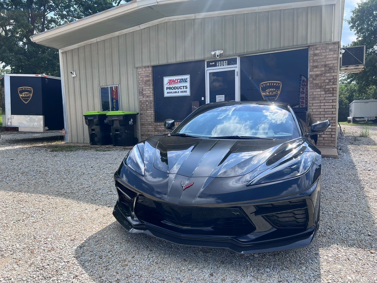 Corvette parked outside the Grimeaway Autoworks shop