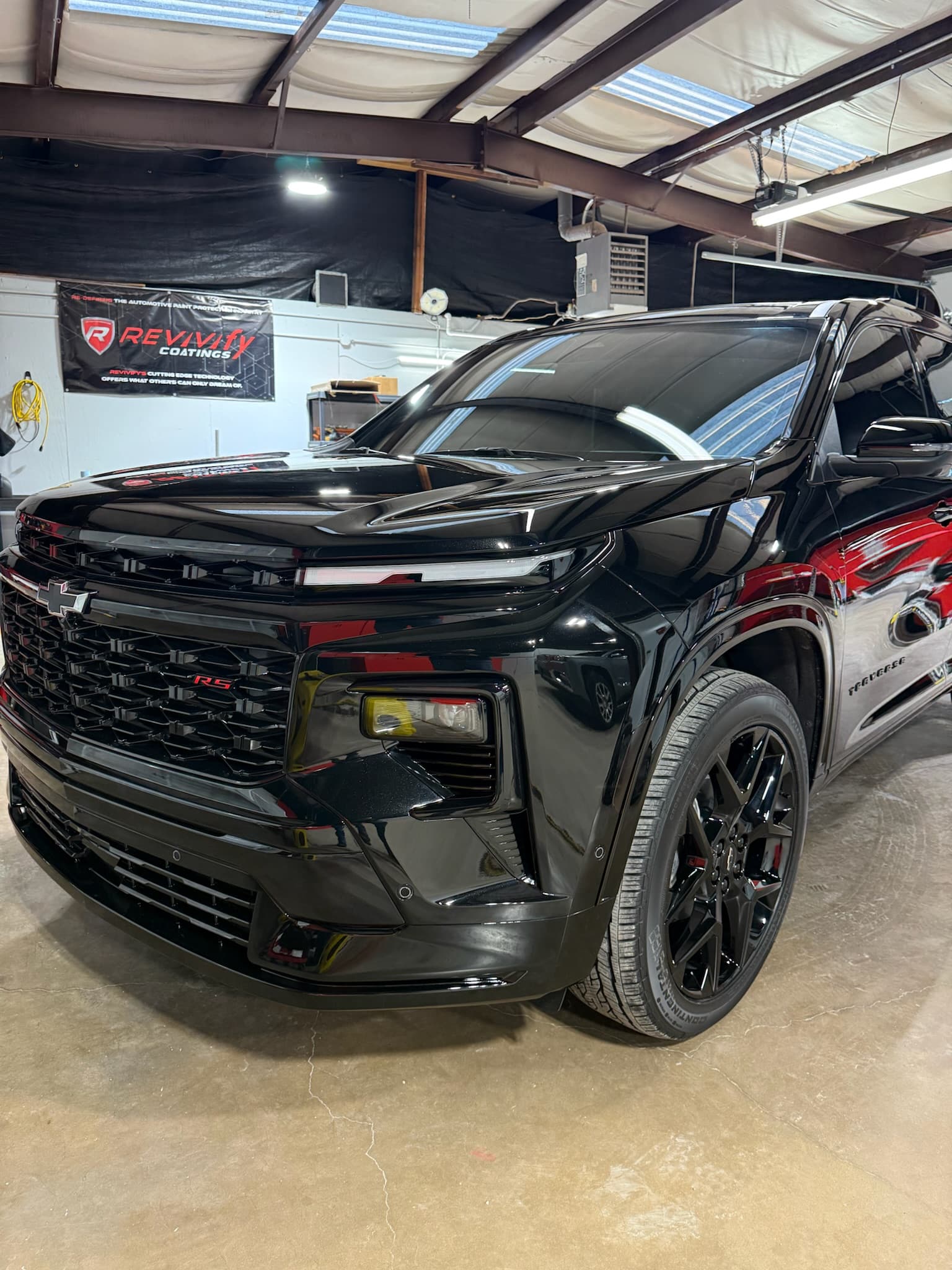 Black SUV coated with Revivify