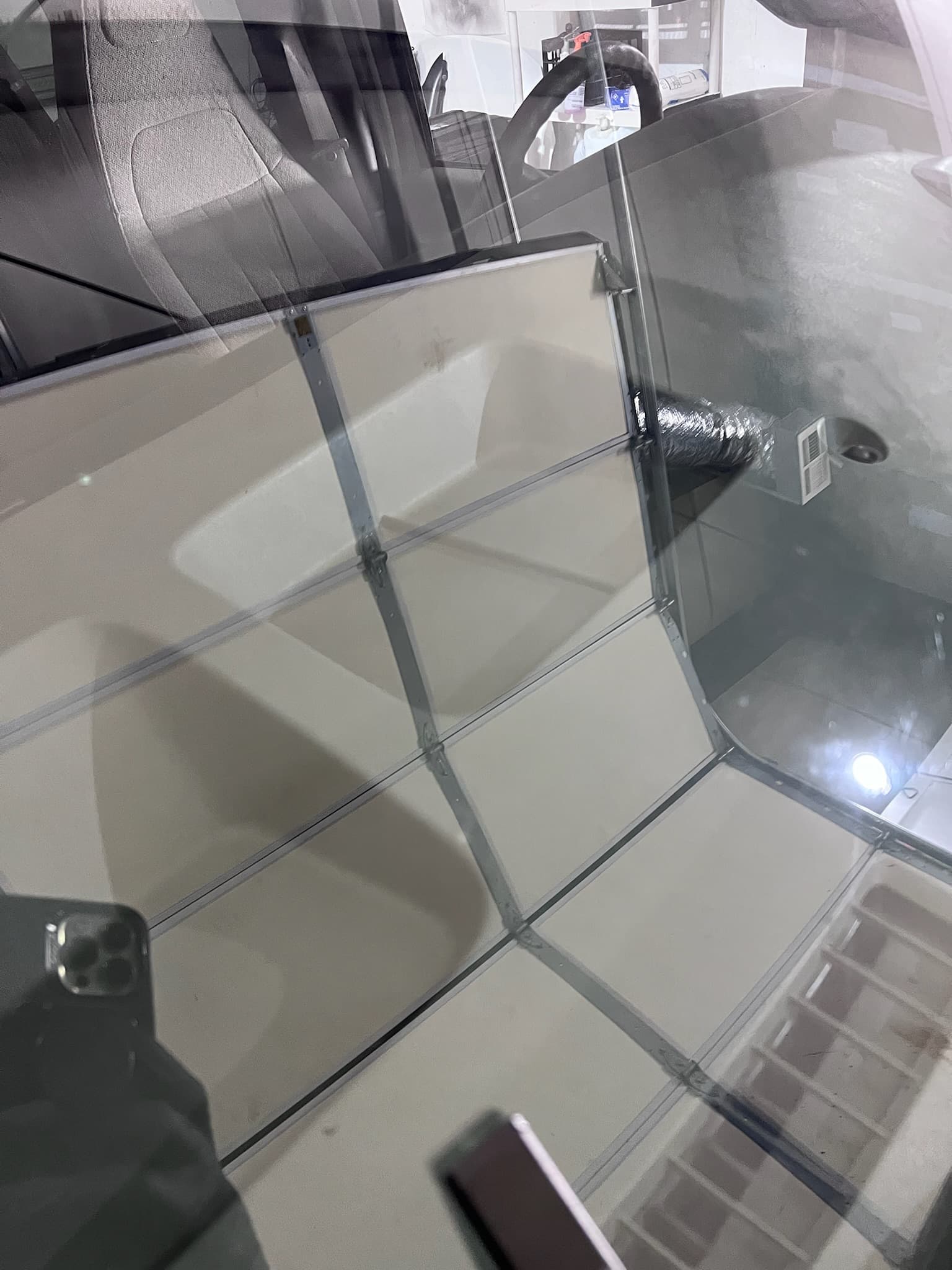 Repaired windshield after resin curing and polishing