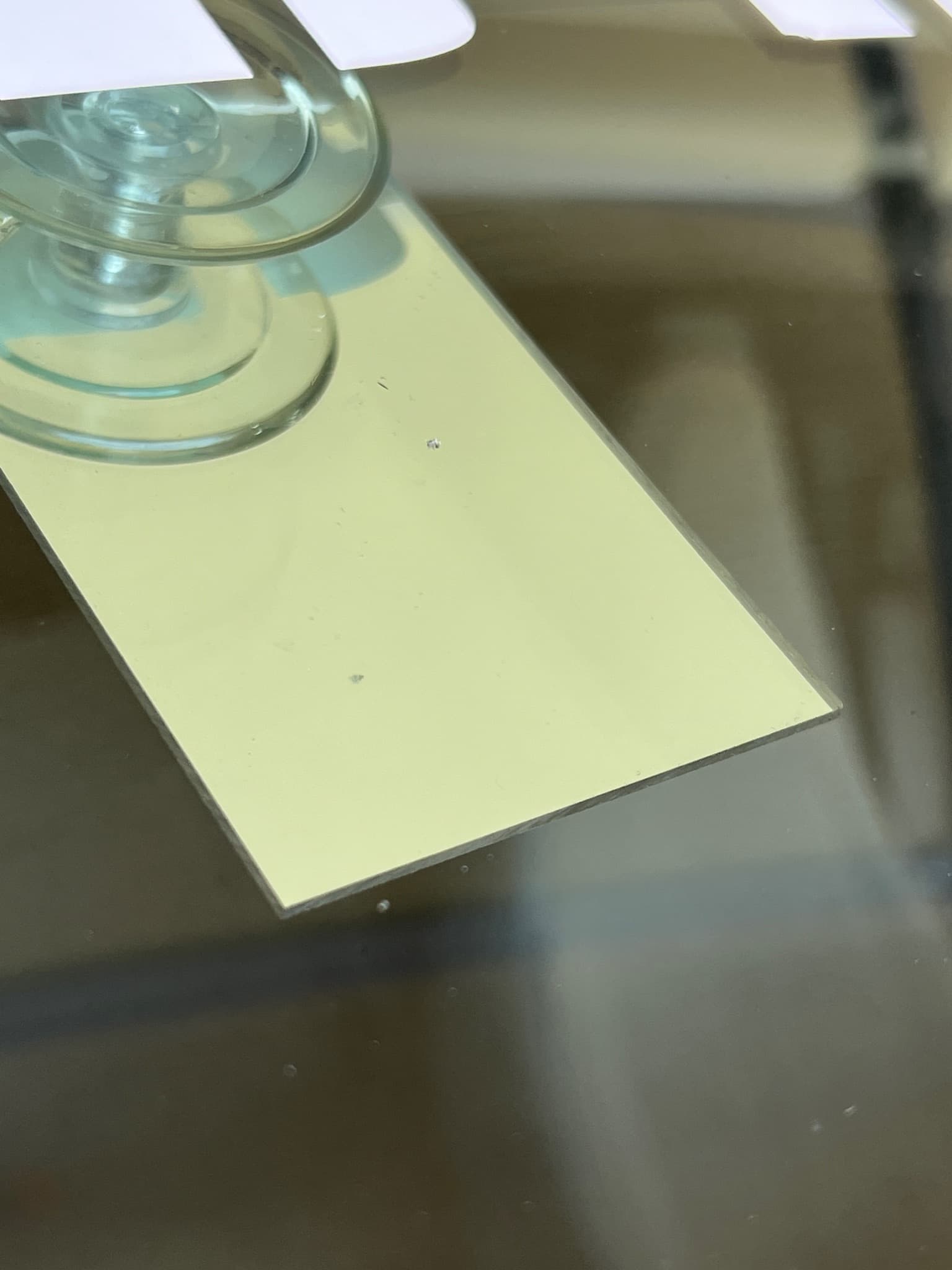 Close-up of auto glass being prepared for resin injection