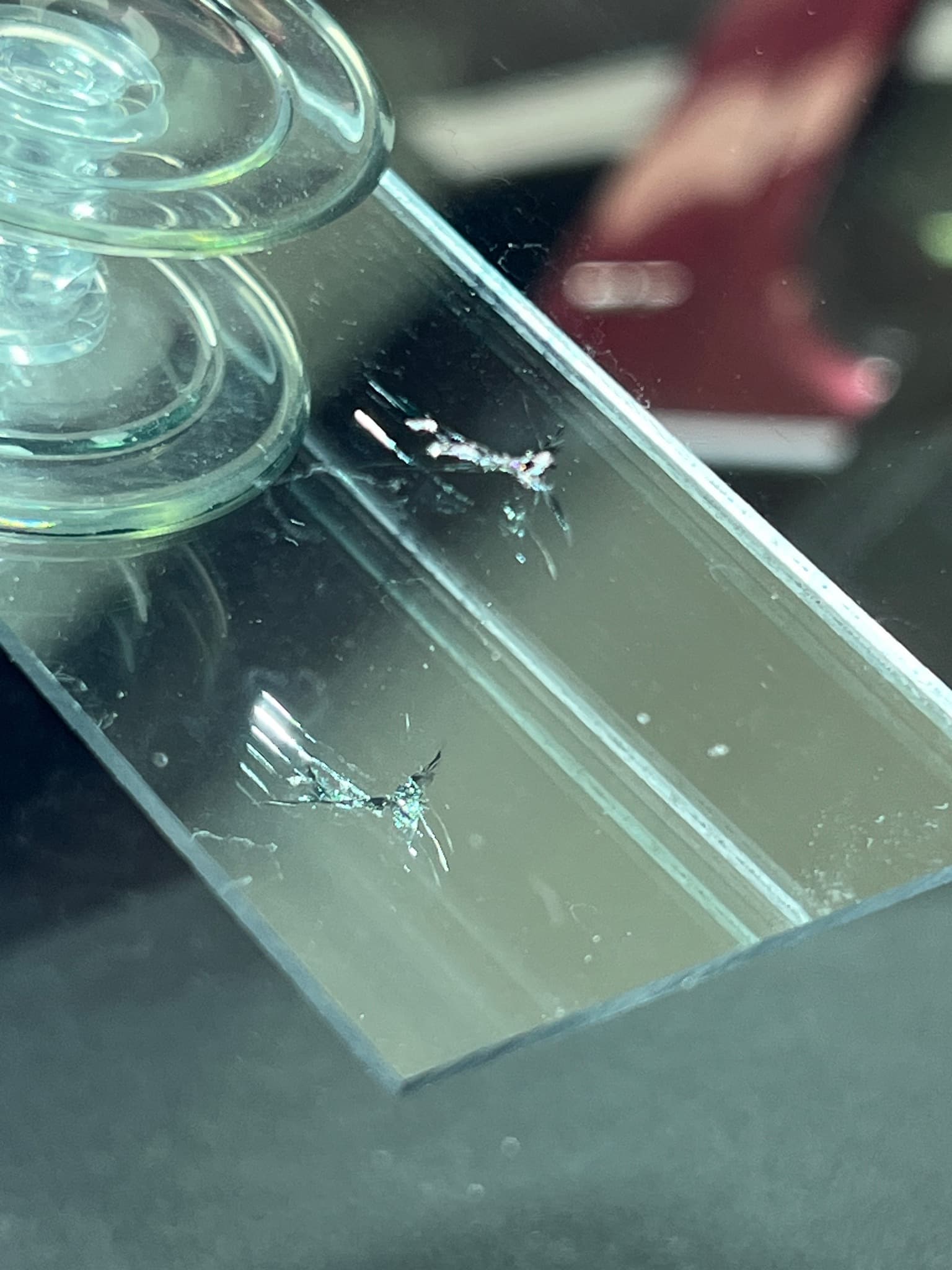 Cracked auto glass before repair